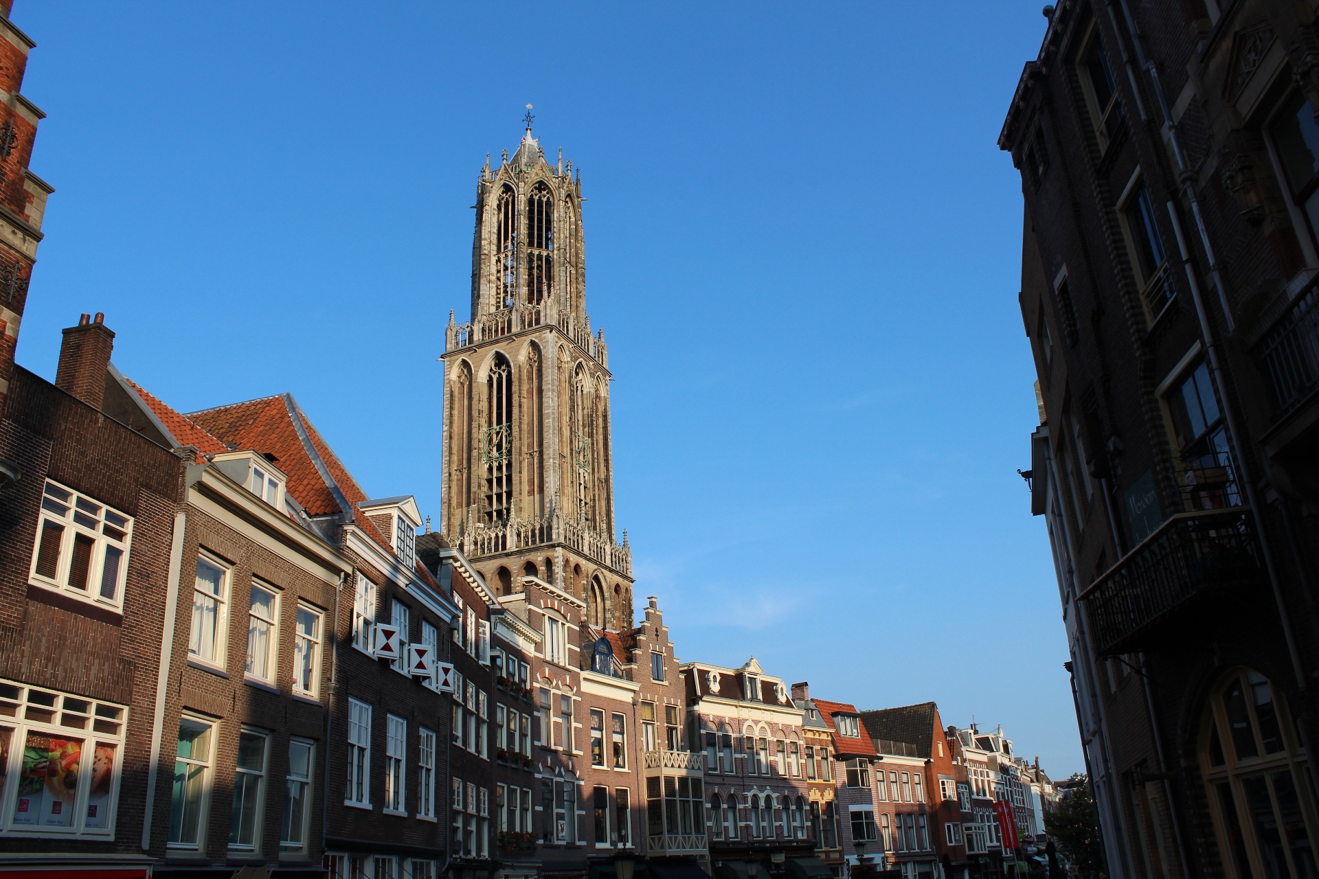 Iconic Dom Tower rising above Utrecht's historic city centre during a free walking tour